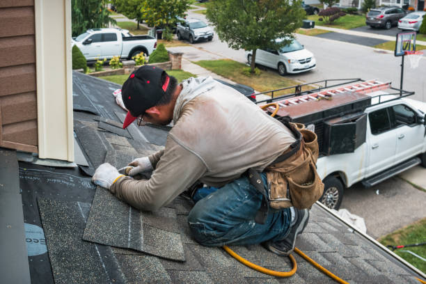 Professional Roofing technician working in Thomaston, NY